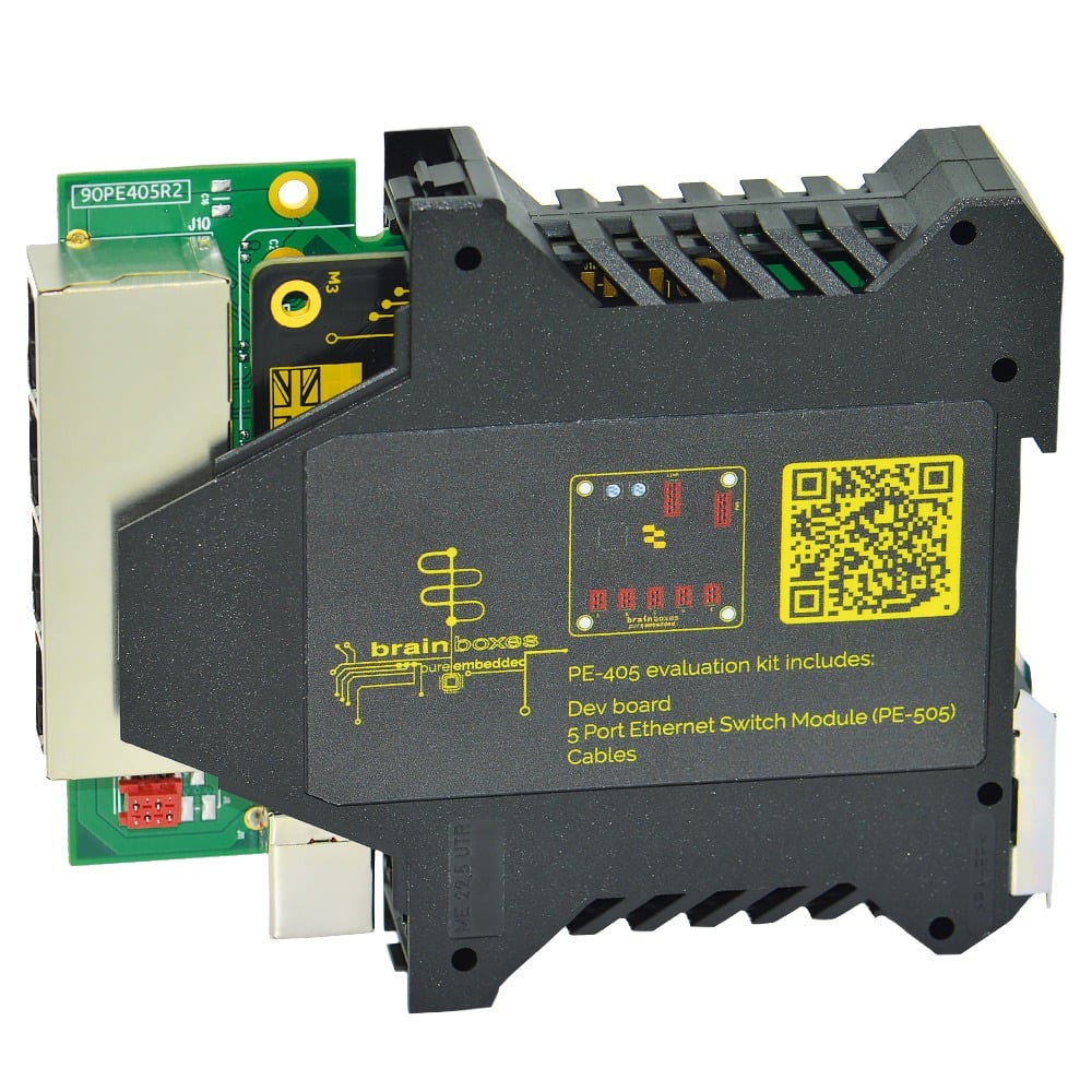 Brainboxes PE-405 industrial ethernet switch mounted on din rail showing rear connections and evaluation kit components