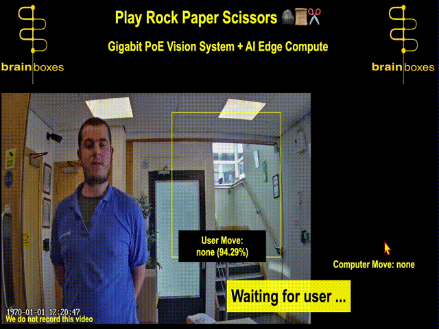 white male plays paper gesture in game of rock paper scissors